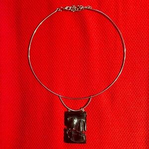 Wire choker with handmade glass pendant.